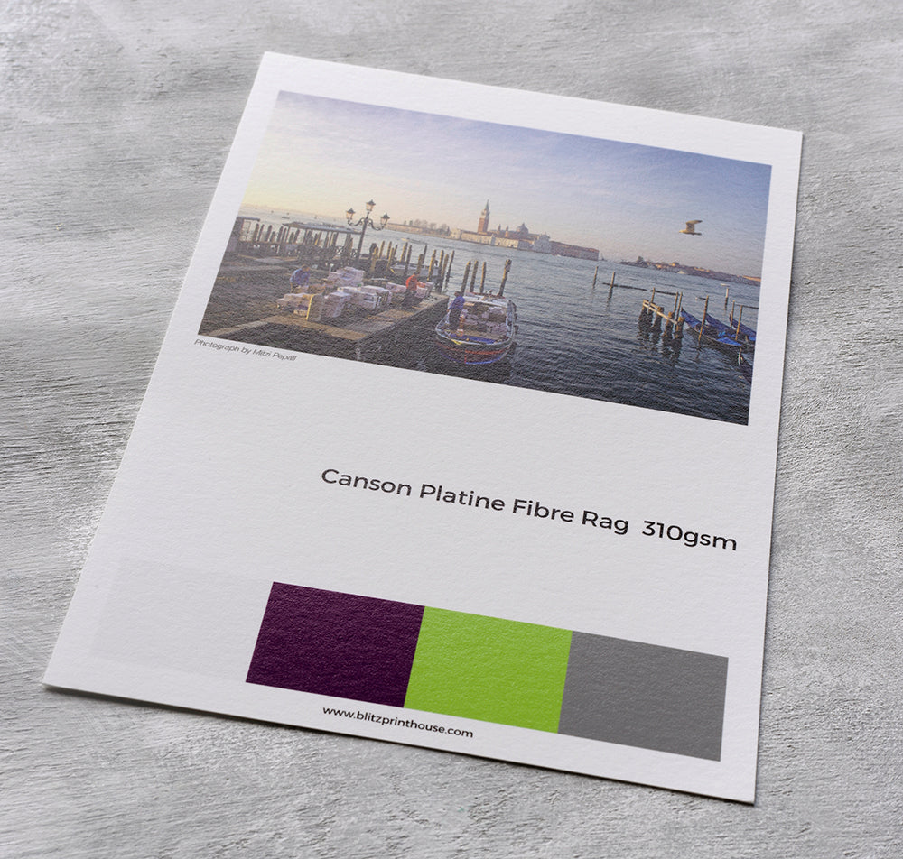 Canson Platine Fibre Rag 310 gsm printed sample card with a Venice waterfront photograph.
