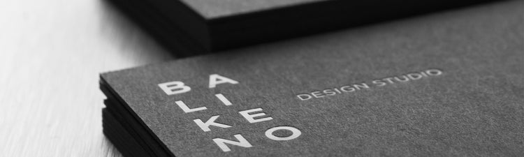 Black business cards with white foil stamping by Blitz Print House