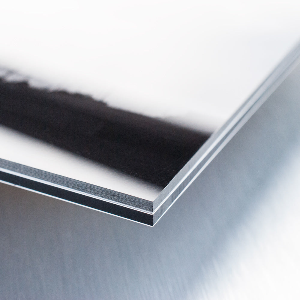 Close-up of the layered corner edge of an acrylic face-mounted print.